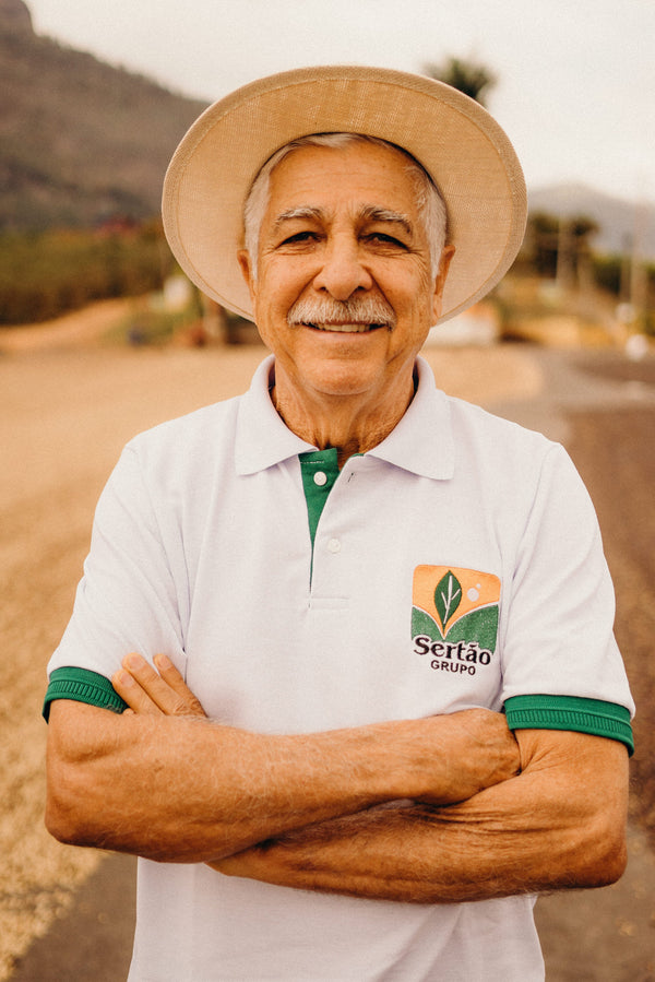 coffee farmer wearing a hat